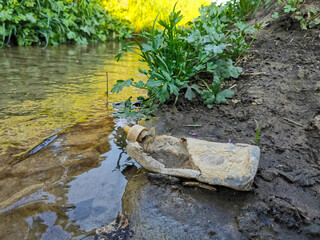 Garbage by the river