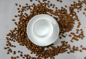White mug and saucer for hot drinks on a neutral background