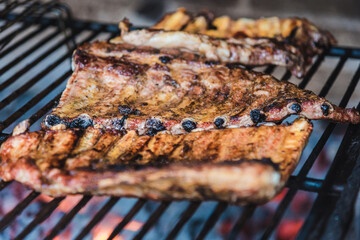 Grilled meat on the grill
