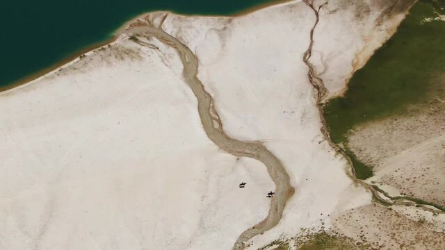 Horseback Riding At Arashan Lake During Summer Vacation In Namangan, Uzbekistan. - aerial