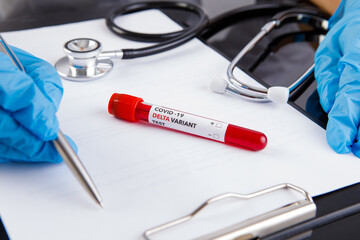 covid 19 delta Variant vaccine and test blood in hand on white background. vaccination against...