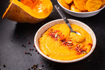 pumpkin cream soup puree fresh portion meal snack on the table copy space food background rustic veggie vegan or vegetarian food