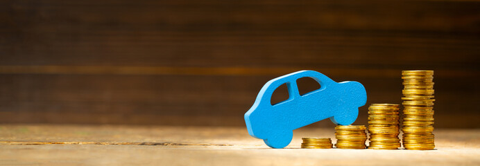 The growth of the car market. Increase in car taxes. Stack of coins with steps up and a blue car....