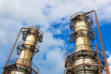 The rectification absorption column is viewed from below at the liquefied gas production plant. Technological equipment.