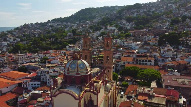 Aerial flypast over the Santa Prisca Church in Taxco Mexico.