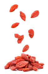 Dry goji berries fall on a heap on a white background. Isolated
