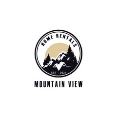 Vintage retro home rentals with mountain view logo design