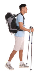 Male hiker with backpack and trekking poles on white background