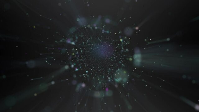 A cluster of colored dots and rays on a blurred black background. An unknown galaxy rotates in different directions.