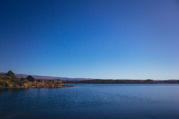 Panoramic winter view of beautiful mountain lake in San Luis, Argentina