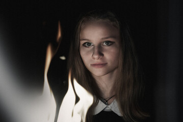 Young girl in the Dark