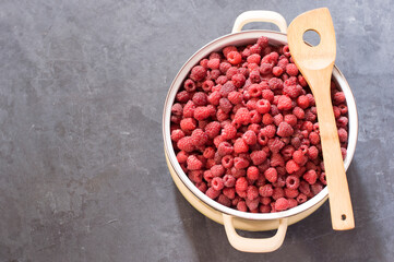 a full pan of ripe raspberries, a large harvest of healthy berries, a healthy diet. Favorite delicacy, preservation of Natural vitamins for the winter, copy space