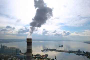 Polluting air with smoke, aerial view of industrial factory. CO2 emissions