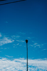 street lamp on blue sky
