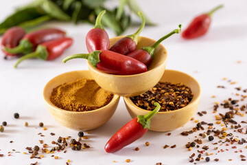 Bowls of chilies in different forms for restaurants and kitchen art