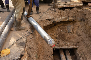 Replacement of sewer pipes. Laying gas pipes in the ground.