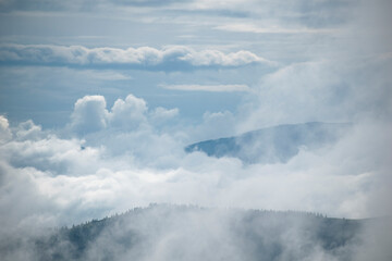 Mountains after the rain. Water evaporates from the forest