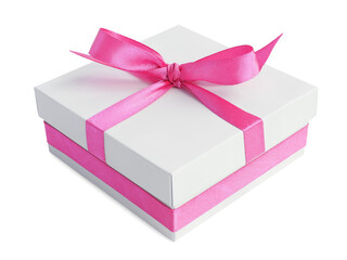 White gift box with pink satin ribbon bow, isolated on white