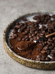 Coffee beans close-up. Macro photography of coffee on a brown background. A place for text in food photos. Arabica.