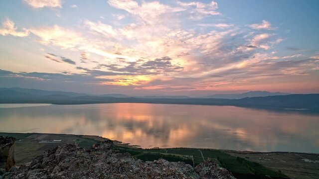 Time-lapse of sunset reflecting in Utah Lake from on West Mountain.