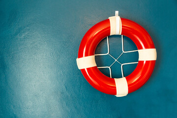 red and white swimming rubber ring on blue background. Floating lifebuoy, toy for beach or ship. Inflatable circle, buoy in pool. Summer sea vacation poster or card.