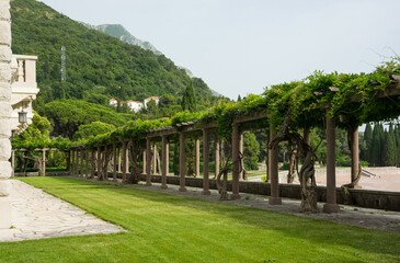 Milocher park with a view to the King's Beach in Sveti Stefan in Montenegro