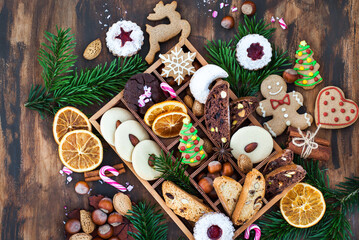 Sweet Christmas cookies in wooden box on rustic table