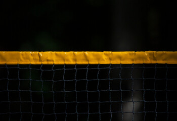 Beach volleyball and beach tennis net on dark background. Horizontal sport poster, greeting cards, headers, website