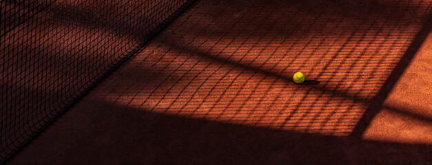 Obraz na płótnie Canvas Orange tennis court net and ball with shadows. Horizontal sport poster, greeting cards, headers, website