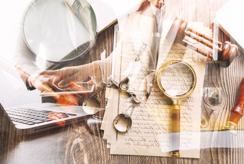 Justice and law concept.Male judge in a courtroom with the gavel, working with, computer and...