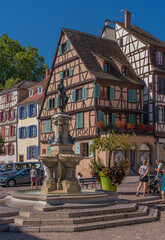 Fototapeta premium Colmar, France - 09 06 2021: Roesselmann fountain by Bartholdi