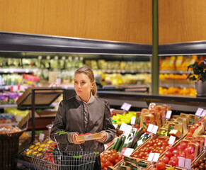 Woman buying vegetables at the market