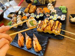 Sushi and chopsticks. Various sushis