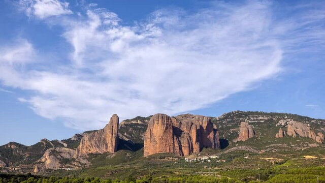 lopable timelapse of clouds passing over los mallos de riglos in spain