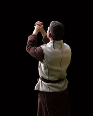 Praying man with raised hands