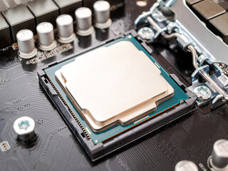 a central processor device, a CPU, an electronic unit or an integrated circuit that executes machine instructions, program code, the main part of the computer hardware