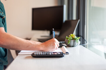 Fototapeta premium Casually dressed young man working remotely