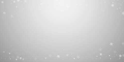 Sparse snowfall Christmas background. Subtle flyin