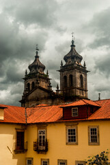 Fototapeta premium Monastery of Tibaes on a dramatic cloudy day, famous religious place of Minho region - Braga, Portugal