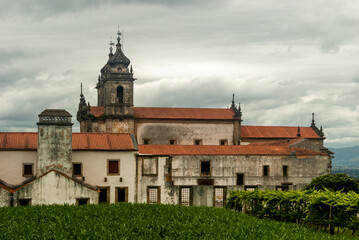 Side view of Monastery of Tibaes on a cloudy day, famous religious place of Minho region - Braga,...