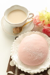 pink sweet bun and milk tea for spring time breakfast