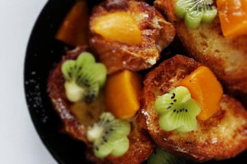 Homemade kiwi fruit and mango French toast for cafe food image