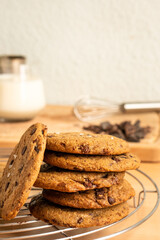 Organic food snack tasty sweet dessert milk dark chocolate chip salt cookie closeup piece fruit orange raspberry hazelnut nuts cinnamon on cocoa cacao powder wooden table for new year Christmas gift