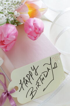 hand written HAPPY BIRTHDAY message card with flower 