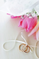Beautiful pink turnip and a pair of rings for wedding image