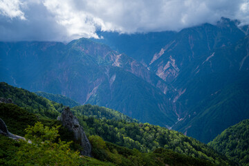 Naklejka na ściany i meble 長野県安曇野市にある燕岳を登山する風景 A view of climbing Mt. Tsubame in Azumino City, Nagano Prefecture. 