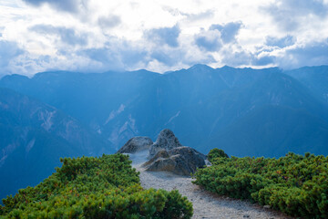 Fototapeta premium 長野県安曇野市にある燕岳を登山する風景 A view of climbing Mt. Tsubame in Azumino City, Nagano Prefecture. 