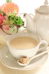 Light brown color glasses and book with milk tea for reading time