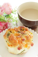 homemade cheese and ham bun on white dish