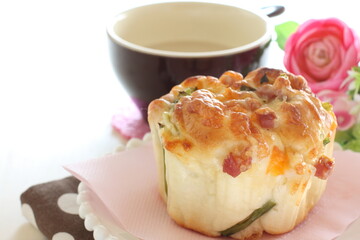 homemade cheese and ham bun on white dish